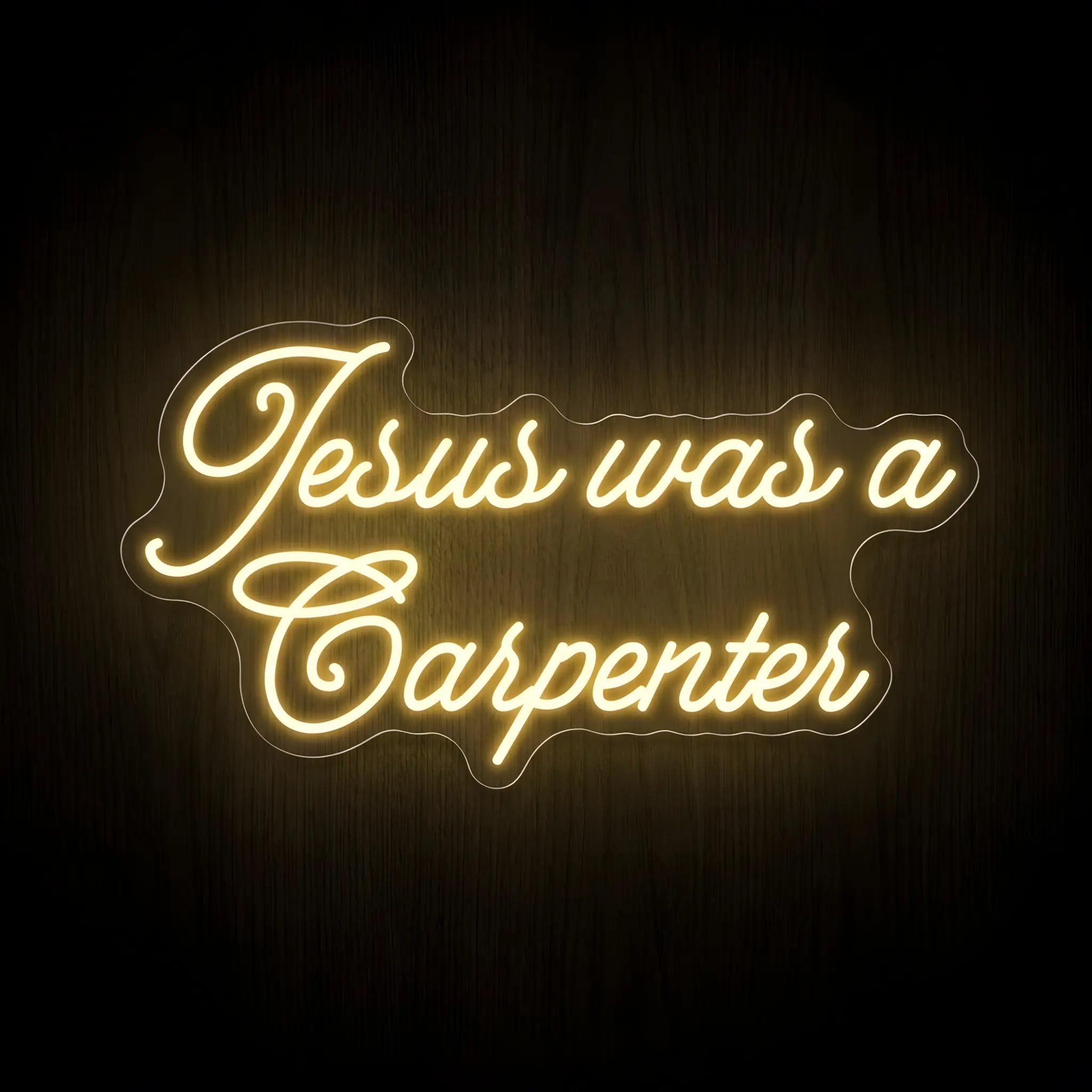 Jesus Was a Carpenter warm white LED neon sign on clear acrylic backing for Christian home, workshop, church, and faith-inspired wall décor.