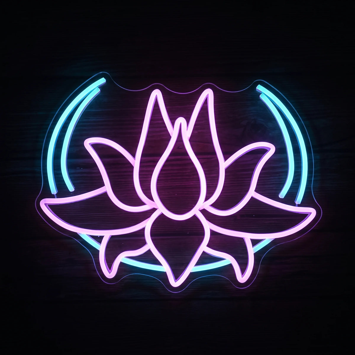 Lotus flower LED neon sign with pink, purple and blue illumination on clear acrylic backing.