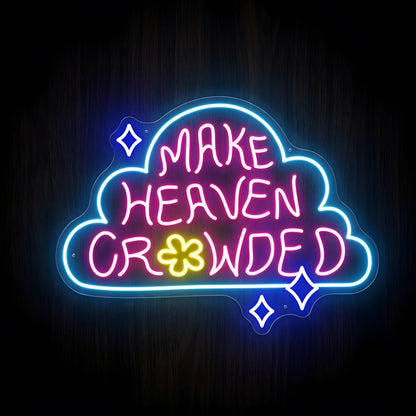 Make Heaven Crowded LED neon sign on precision-cut acrylic backing featuring blue cloud outline, pink lettering, yellow flower accent, and Christian wall decor.