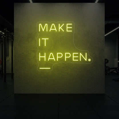 'MAKE IT HAPPEN' neon sign glowing in lemon yellow against a styled interior wall.