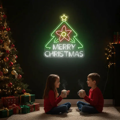 Photo of the 'Merry Christmas with Flower Tree' neon sign glowing against a styled interior wall.