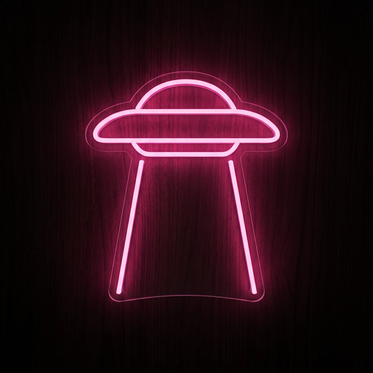 Minimal UFO LED Neon Sign featuring a pink flying saucer outline with descending light beams on clear acrylic backing.