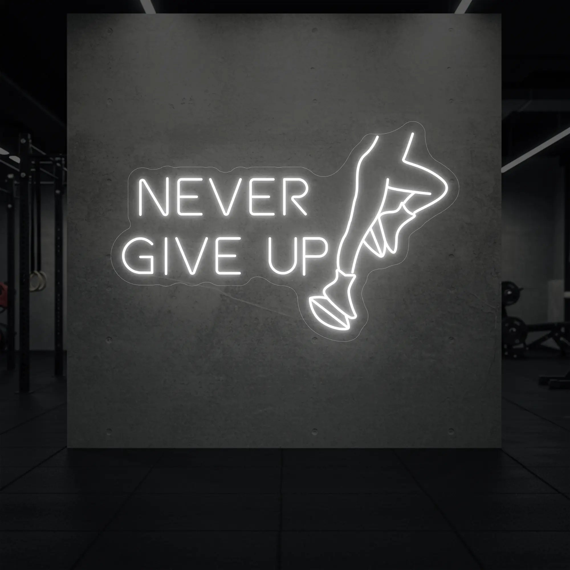 'NEVER GIVE UP' neon sign glowing in cool white against a styled interior wall.