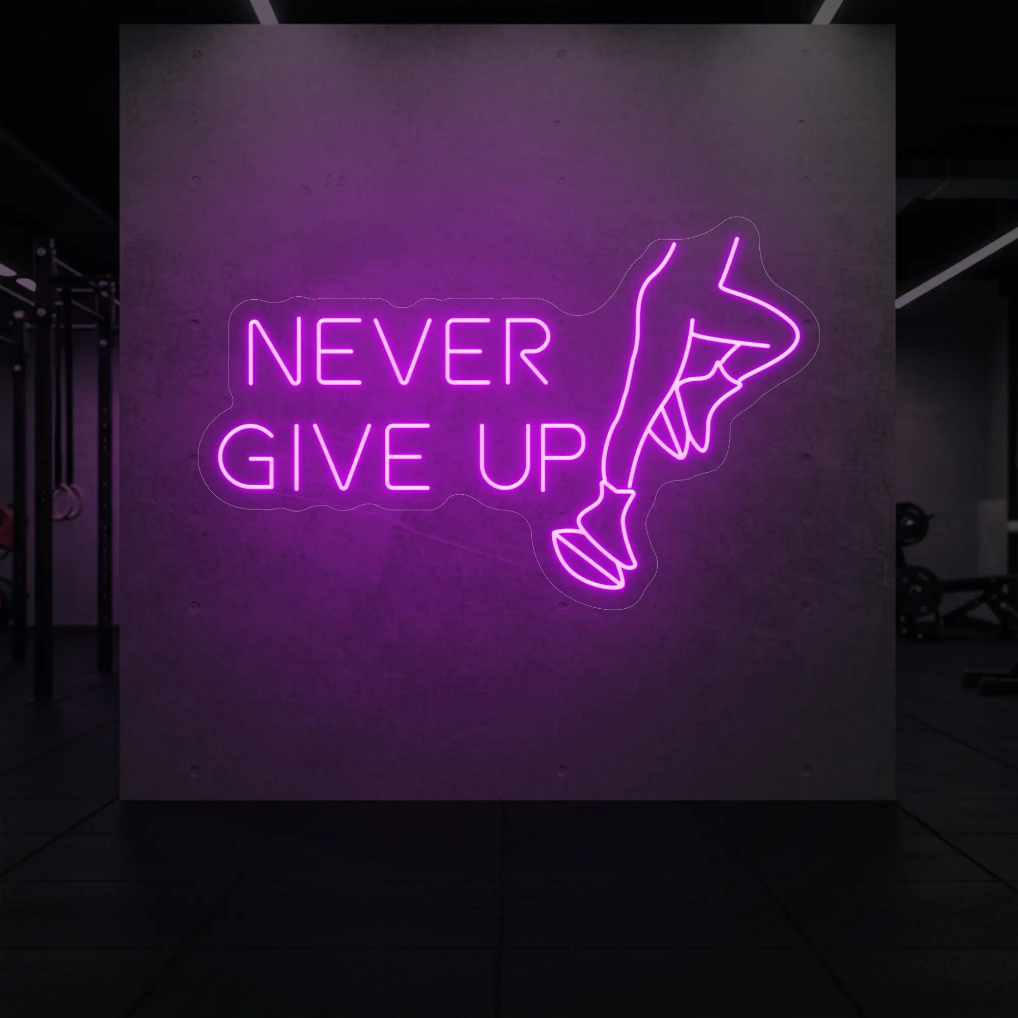  'NEVER GIVE UP' neon sign glowing in deep pink against a styled interior wall.
