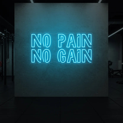  'NO PAIN NO GAIN' neon sign glowing in ice blue against a styled interior wall.