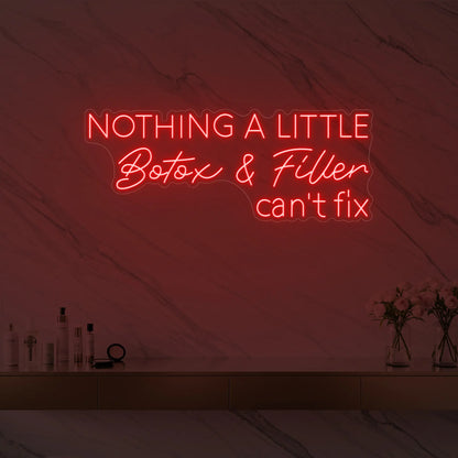 Photo of the 'Nothing a Little Botox & Filler Can’t Fix' neon sign glowing in red against a styled interior wall.