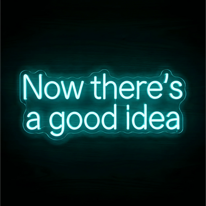 Now there's a good idea LED Neon Sign with bright aqua lettering on clear acrylic against a dark wood background, suited to creative studios and home offices.