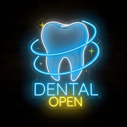 Orbiting Tooth Dental Open LED neon sign featuring a blue tooth with glowing orbital rings, sparkling accents, blue DENTAL lettering, and yellow OPEN text on clear acrylic backing against a dark wooden wall.