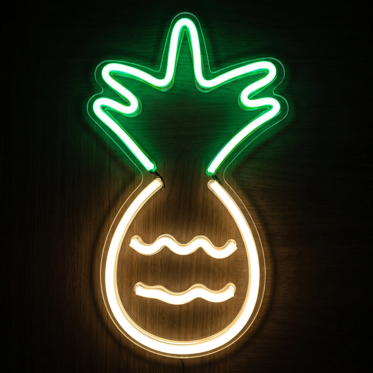 Pineapple LED Neon Sign with a warm white pineapple outline and vibrant green leafy crown on clear acrylic backing.
