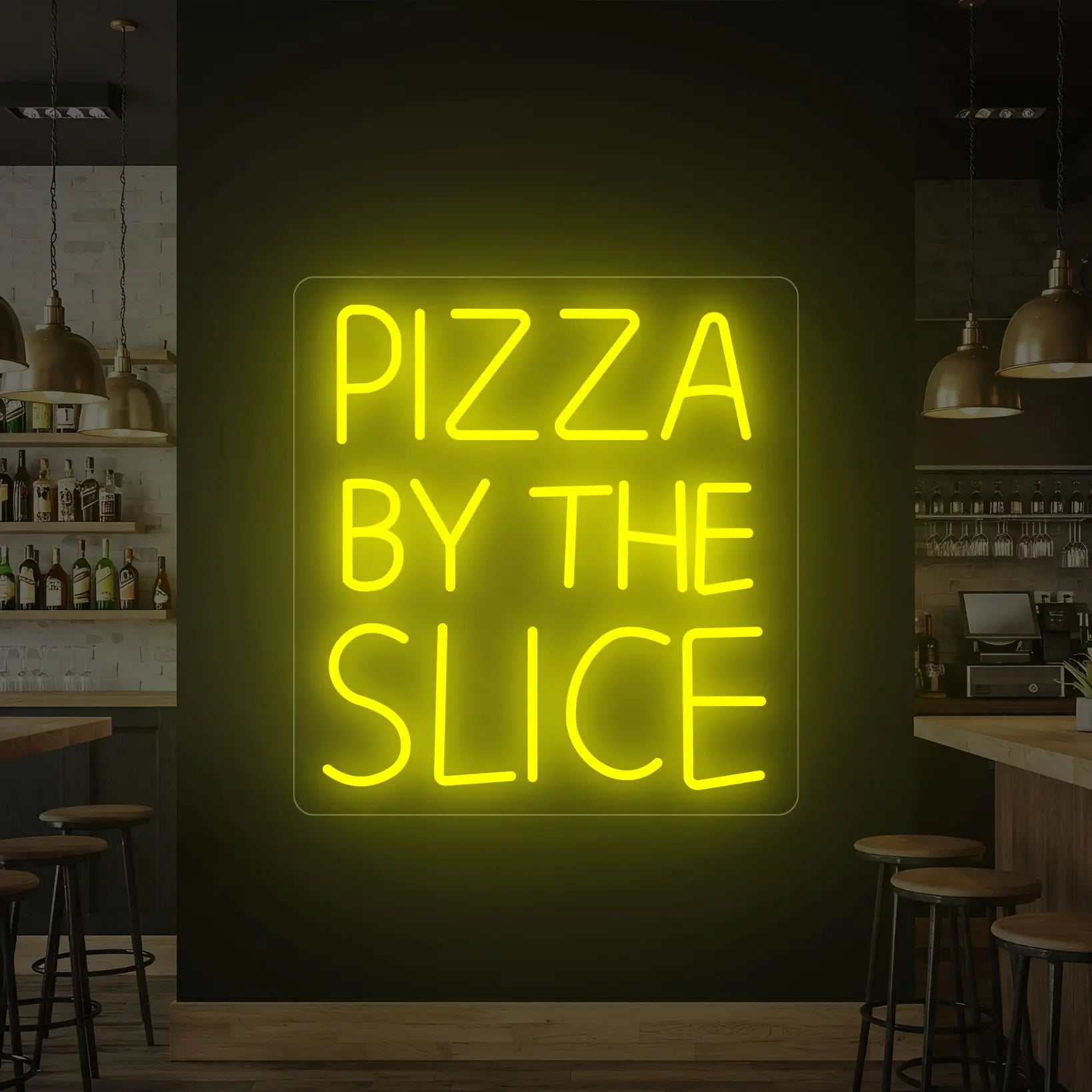 Photo of the 'PIZZA BY THE SLICE' neon sign glowing in lemon yellow against a styled interior wall.