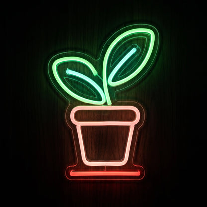 Potted Plant LED Neon Sign featuring two green leaves and a pink and red plant pot on clear acrylic backing.
