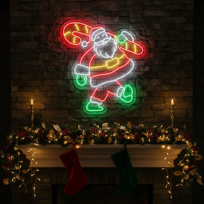 Photo of the 'Santa With Candy Cane' neon sign glowing in multicolor against a styled interior wall.