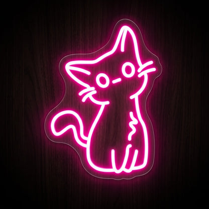 Sitting Kitty LED Neon Sign featuring a cute seated cat outline with whiskers and a curled tail in bright pink neon.