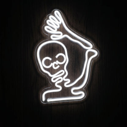 Skeleton Shaka LED Neon Sign featuring a white glowing skeleton making a shaka hand gesture on clear acrylic backing.
