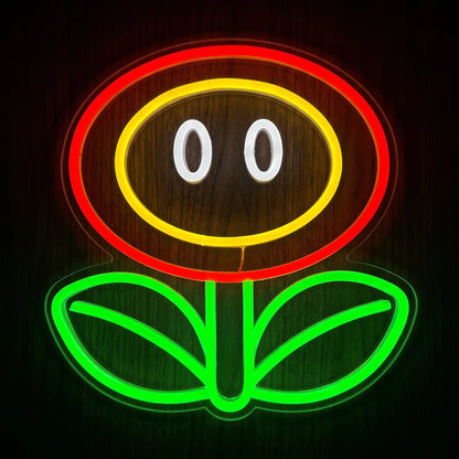 Smiley Flower LED Neon Sign featuring a red and yellow flower face with white eyes and bright green stem and leaves on clear acrylic backing.