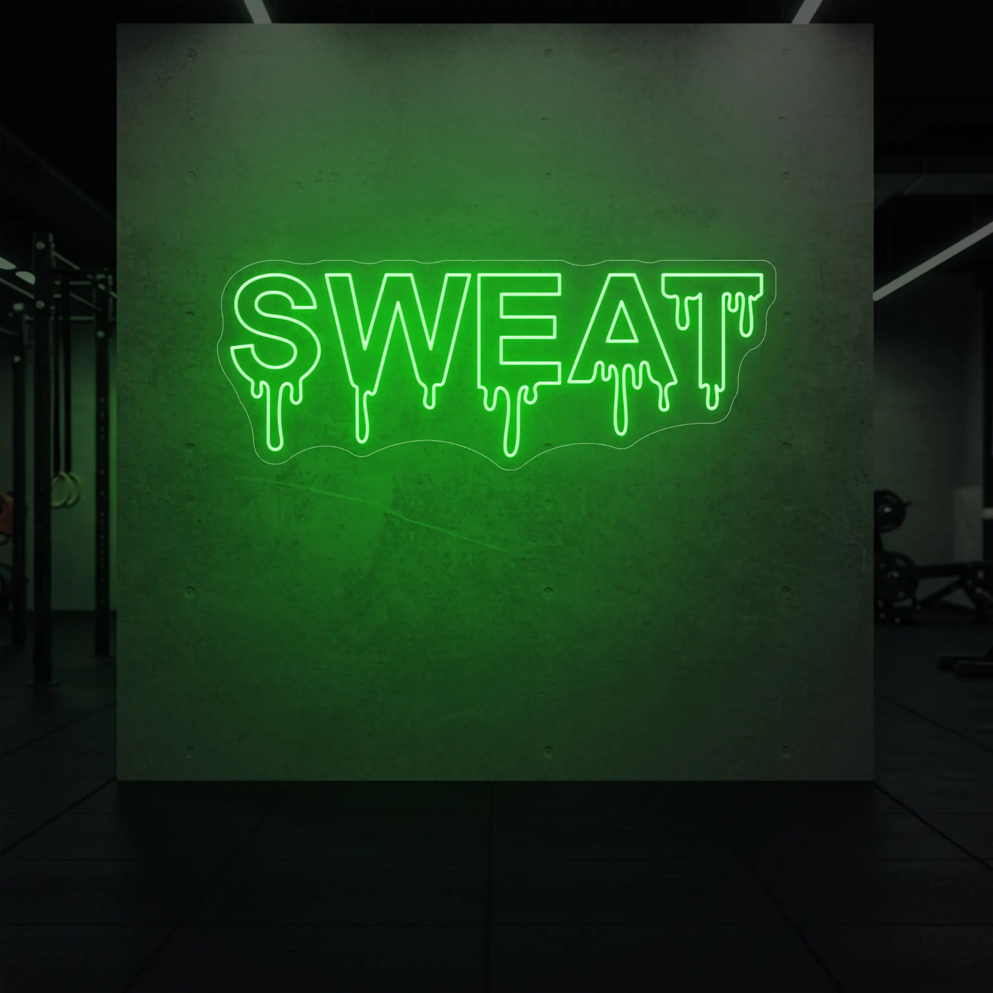 'SWEAT' neon sign glowing in green against a styled interior wall.