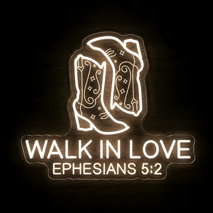 Walk In Love Ephesians 5:2 LED neon sign featuring decorative boots on precision-cut acrylic backing with warm white illumination for Christian wall decor.