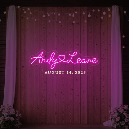 Photo of the 'Wedding First Names Custom Neon Sign' neon sign glowing in light pink against a styled interior wall.