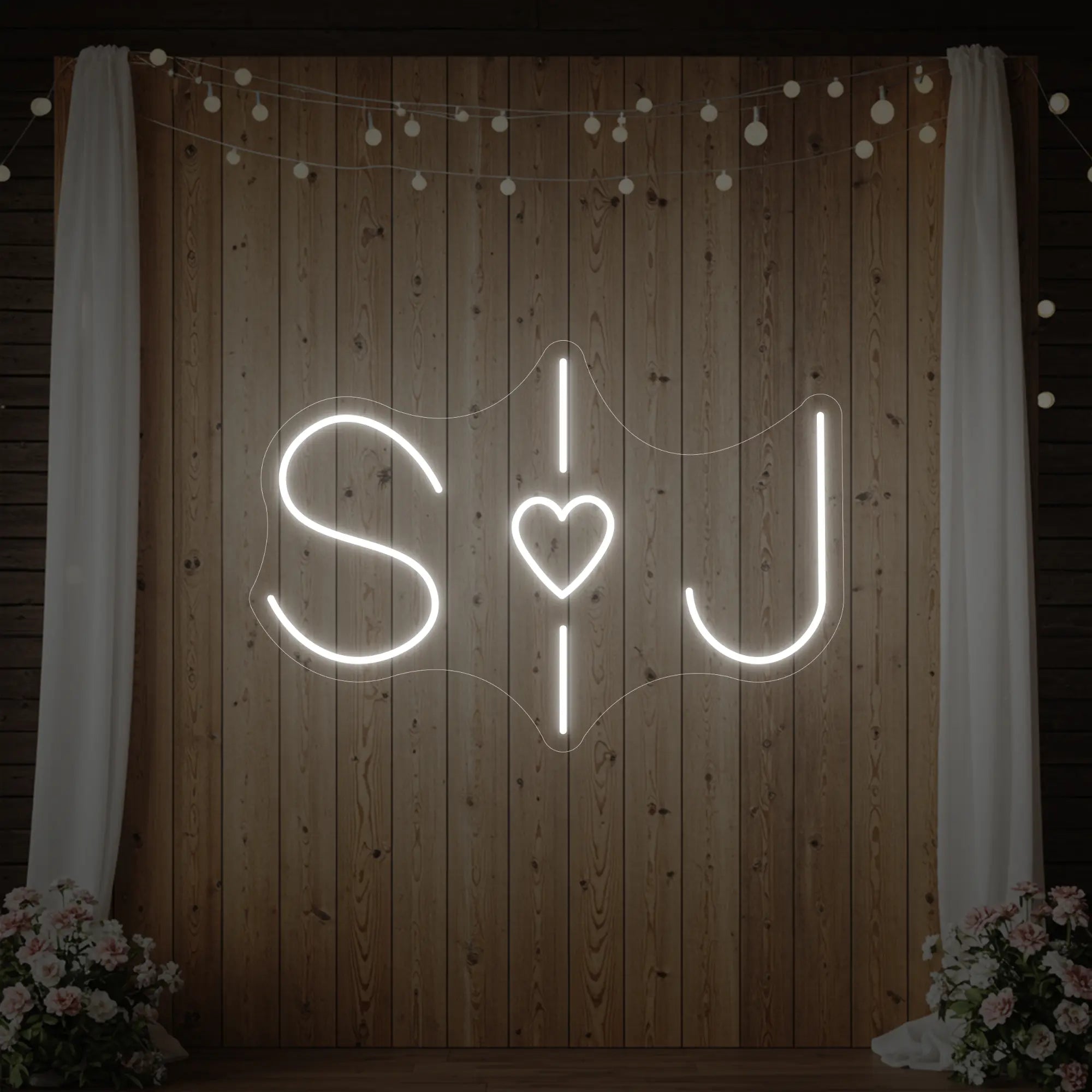 Photo of the 'Wedding Initials Custom Neon Sign V6' neon sign glowing in cool white against a styled interior wall.