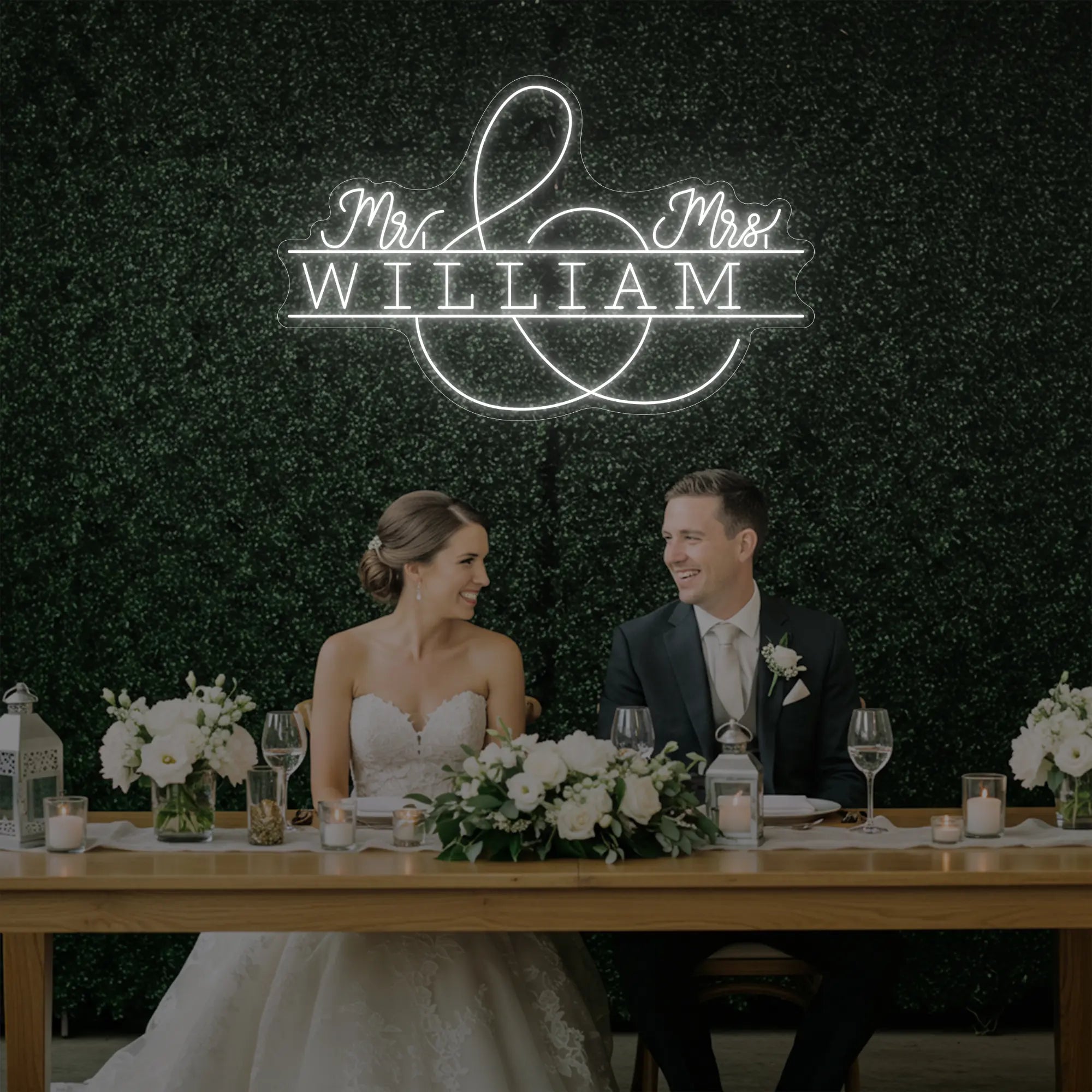 Photo of the 'Wedding Last Names Custom Neon Sign V3' neon sign glowing in cool white against a styled interior wall.