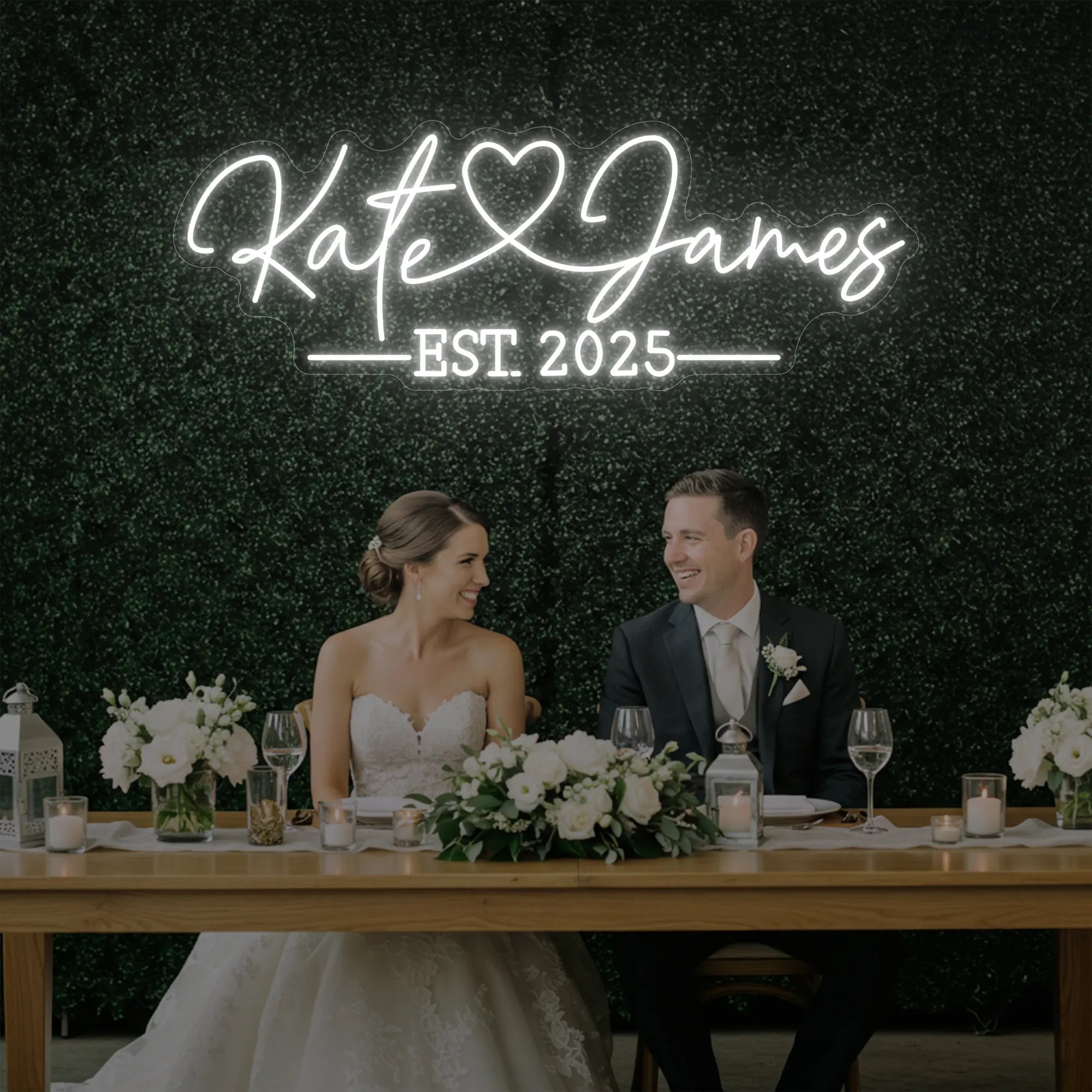 Photo of the 'Wedding Names Custom Neon Sign' neon sign glowing in cool white against a styled interior wall.