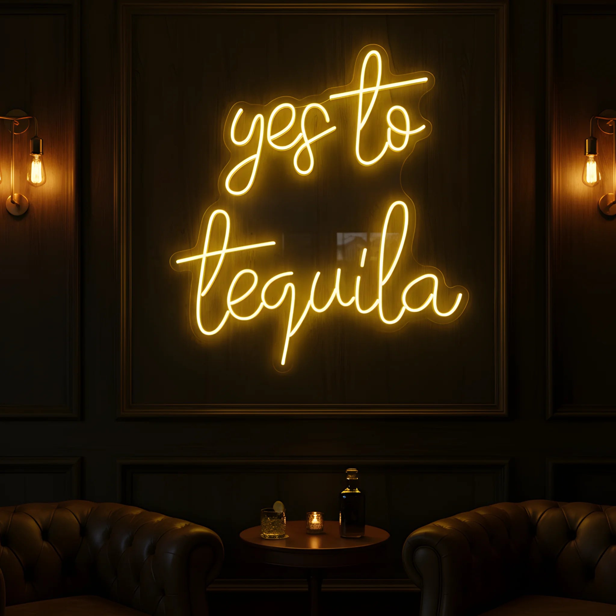 Photo of the 'Yes to Tequila' neon sign glowing in yellow against a tequila bar-inspired wall.