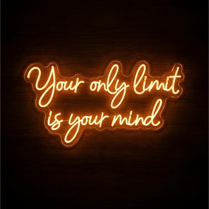 Your Only Limit Is Your Mind LED Neon Sign in warm amber script lettering on clear acrylic against a dark wood background, suited to home offices and bedrooms.